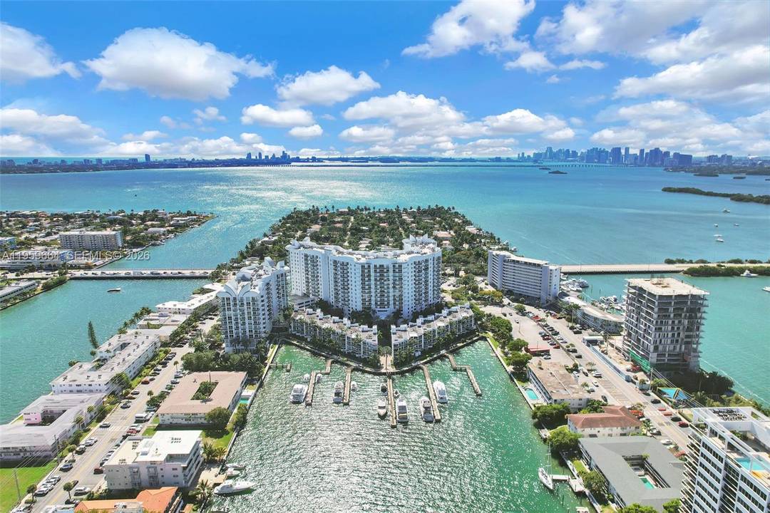 Experience luxurious island living at 7910 Harbor Island Dr 1103 in the desirable 360 Condominium of North Bay Village.