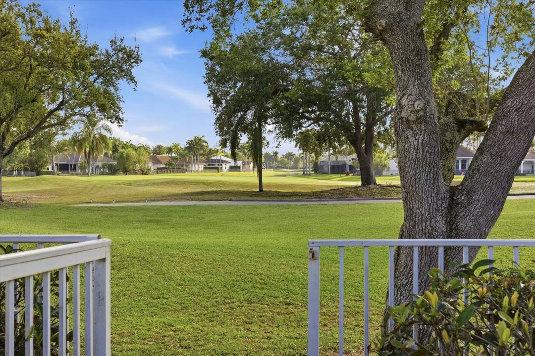 One of a kind floor plan with spectacular golf course views in the prestigious Weston Hills Country Club.