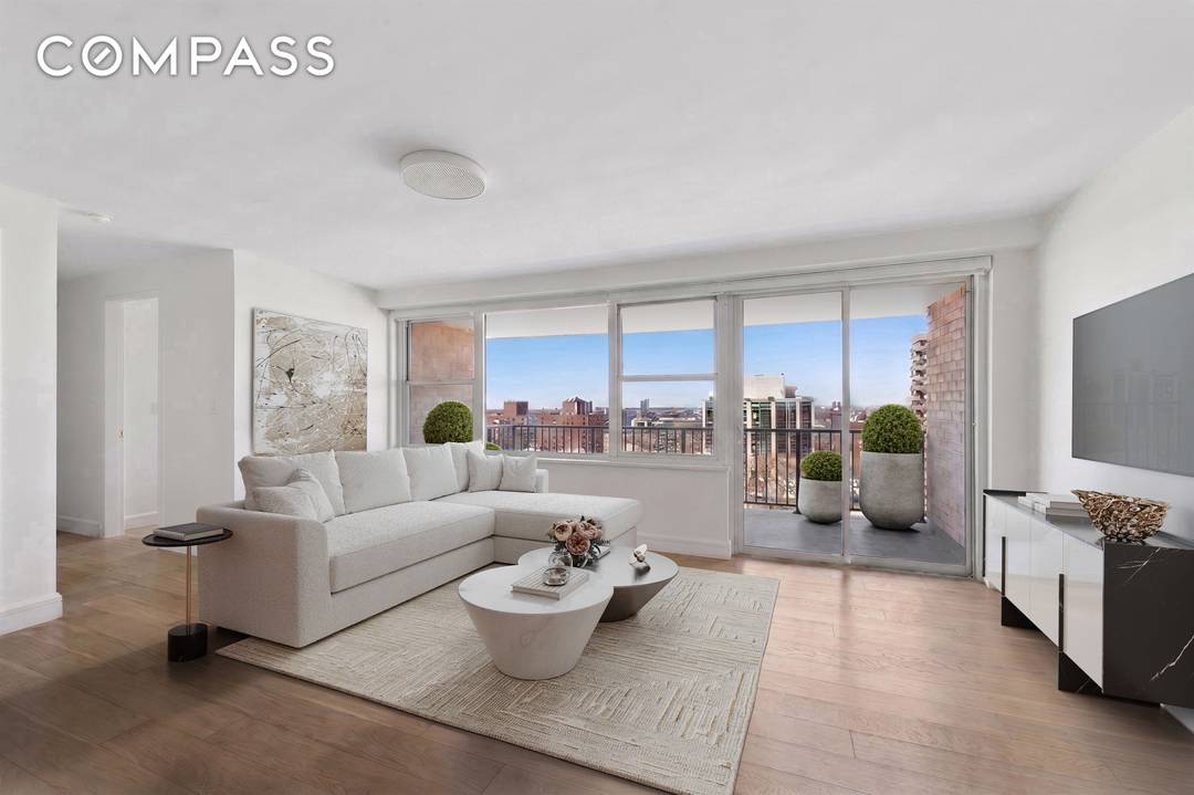Perched high above the Upper West Side, this beautifully renovated two bedroom, two bath residence is flooded with natural light and framed by expansive open views.