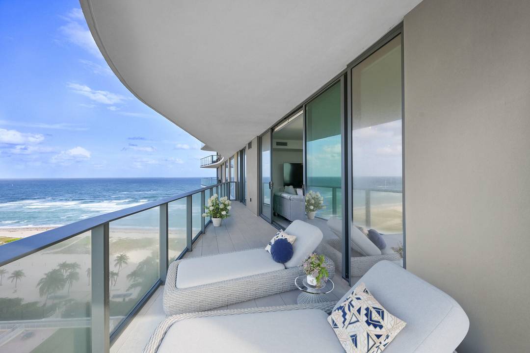 Stunning fully furnished corner condo with ocean views and beautifully curated interiors with high end finishes.