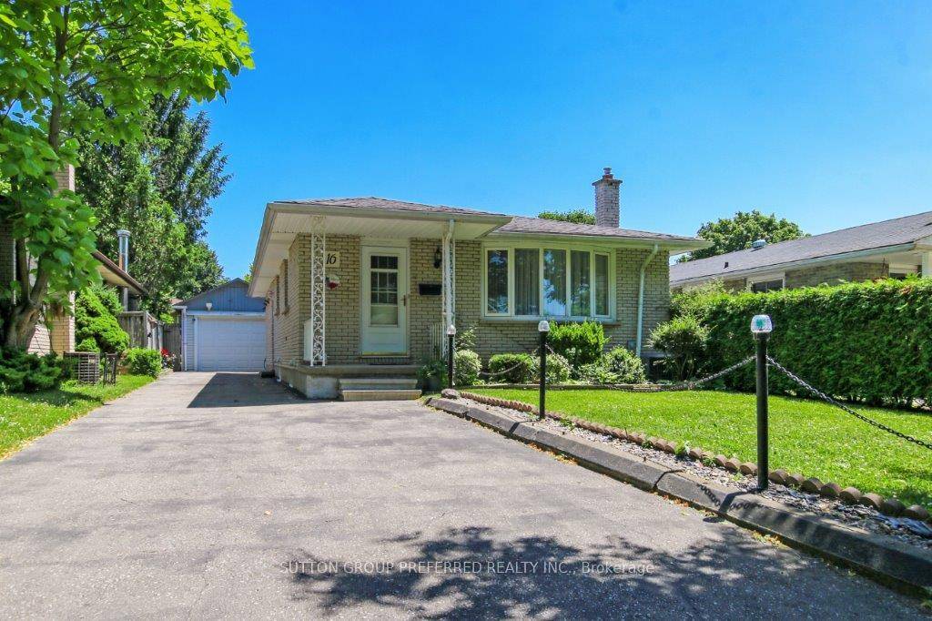 Great curb appeal, this extra sized all brick, 3 bedroom bungalow on a quiet street with an oversized garage shed.