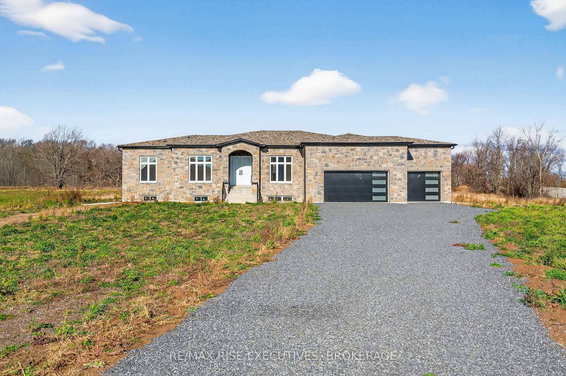 Quality built custom bungalow by Raven Oak Homes offering over 2, 530 sq.