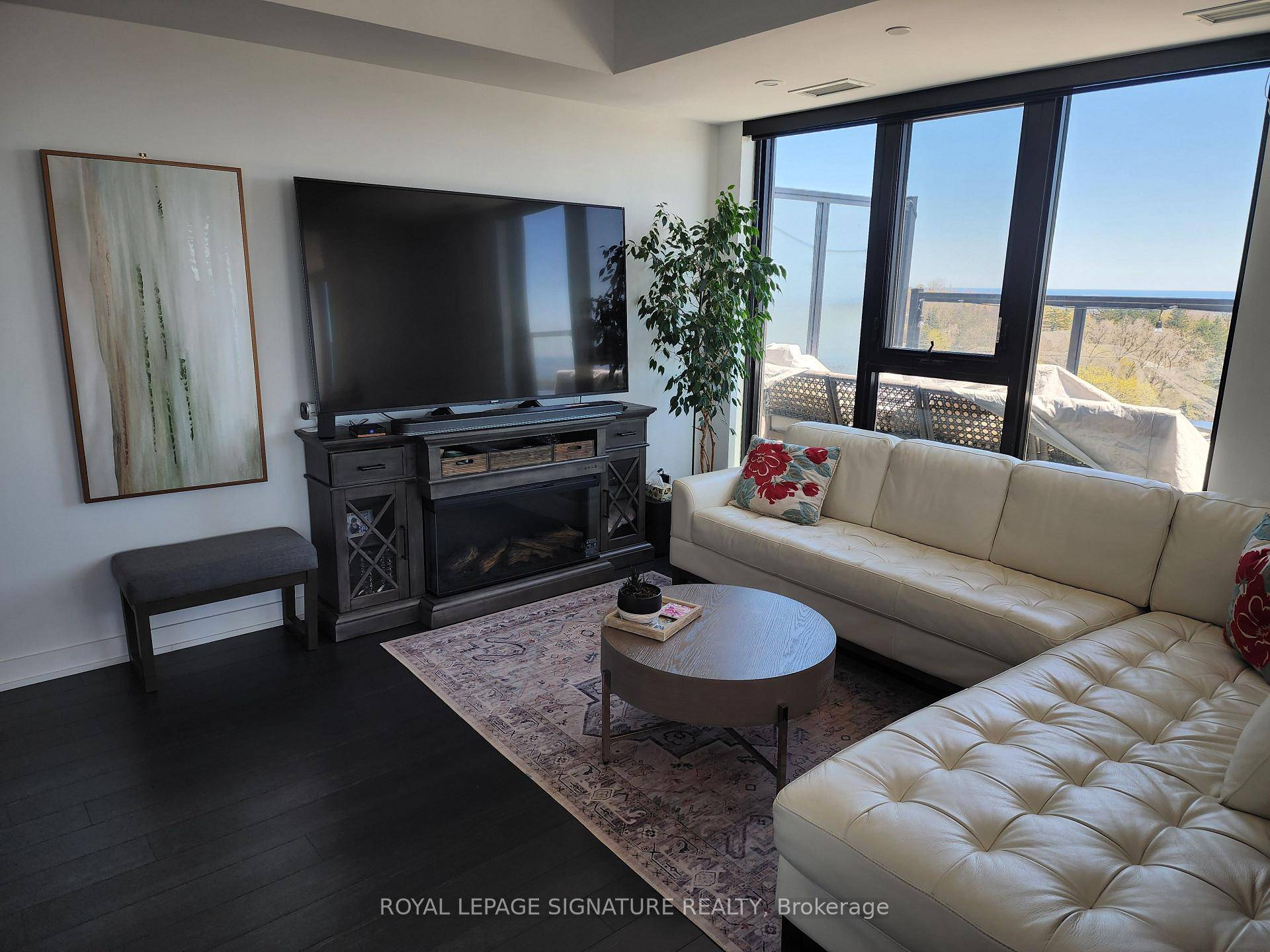 Discover unparalleled luxury living at The Bluffs Condo Penthouse, a magnificent 1, 560 square foot, two story corner unit offering breathtaking views of Lake Ontario and the Toronto skyline.