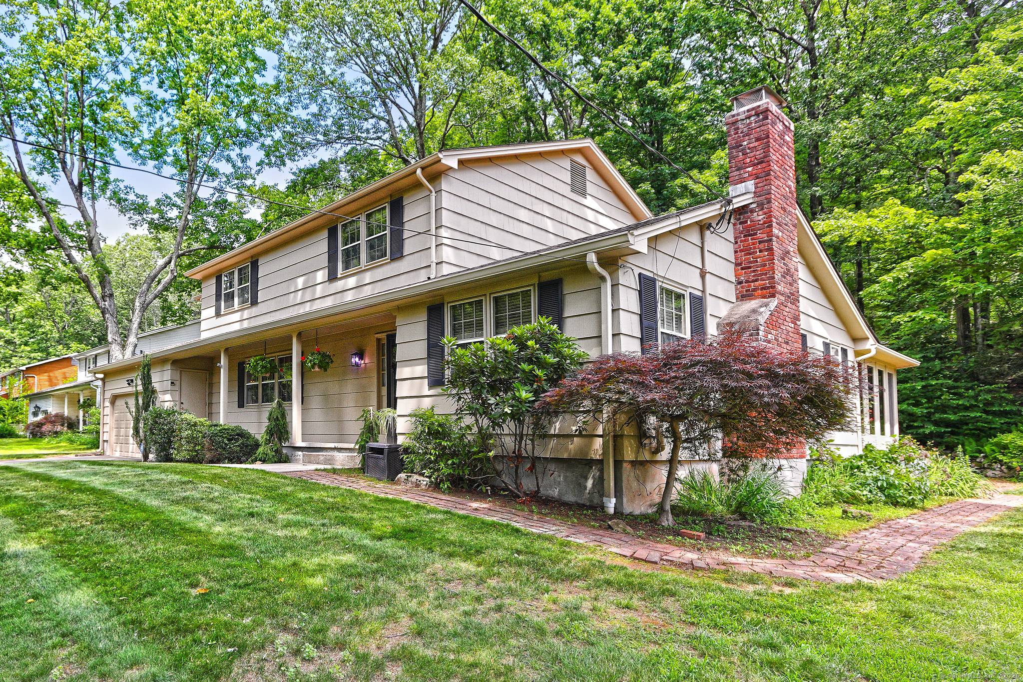 4 Bedroom, 2 1 2 Bath, 2300 Sq Ft Colonial, updated and loved by one family for over 51 years.