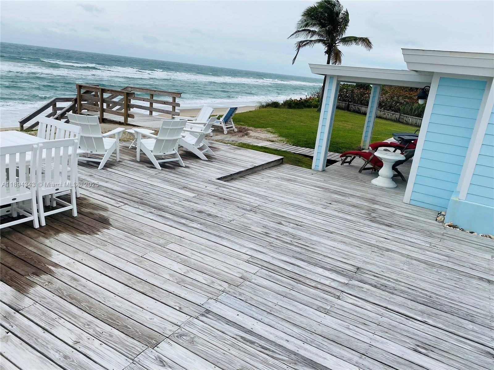 Very cozy 2 storey house with private beach.