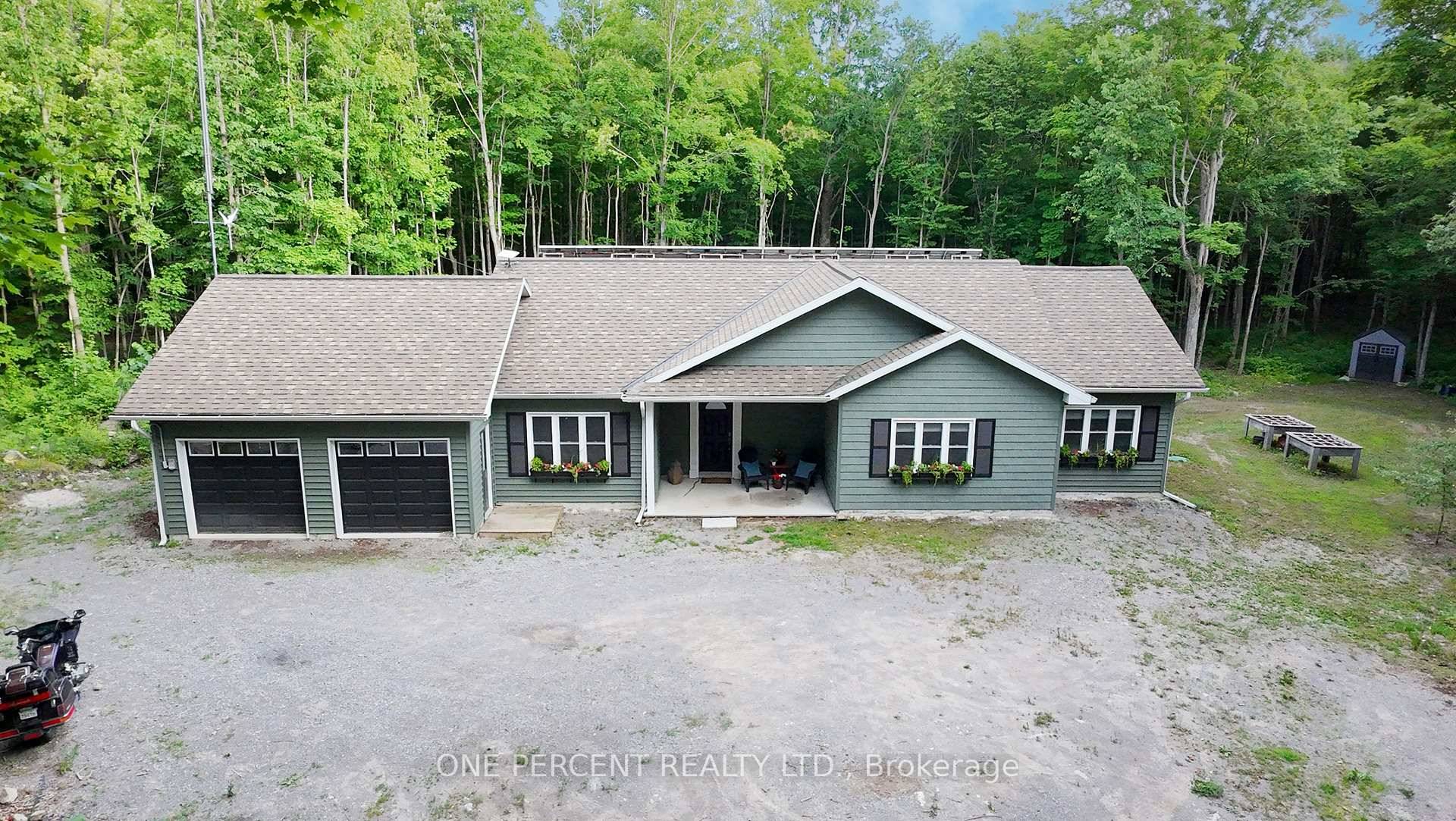Unique opportunity to live truly off grid in this modern, solar powered home featuring a drilled well, propane heating, and an outdoor wood burner for supplementary heat.