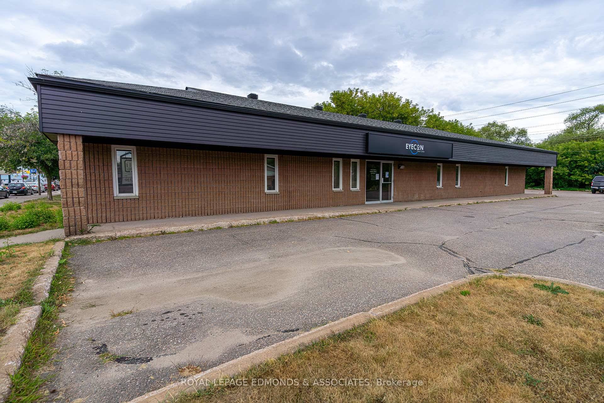 One of a kind commercial opportunity awaits with this well maintained, all brick, purpose built medical building situated on a large corner lot in a high traffic location.