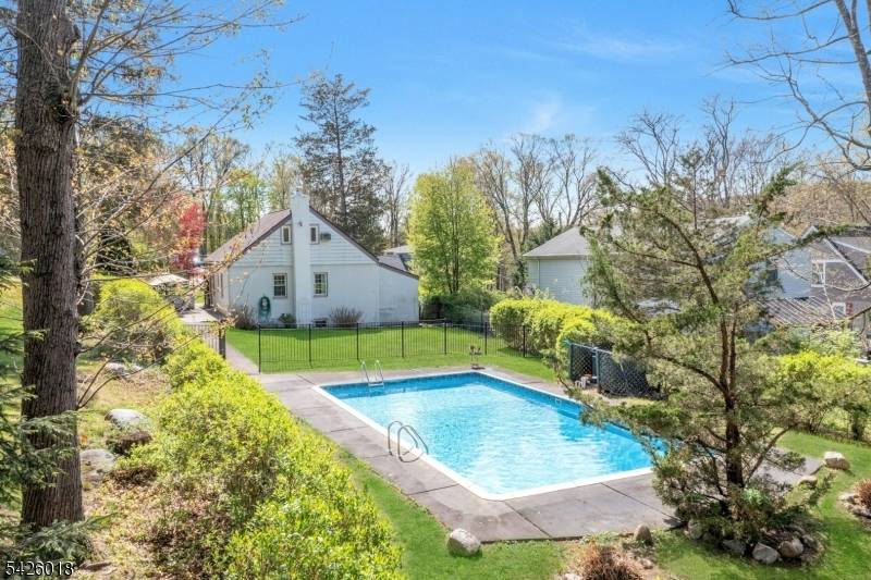 Charming and thoughtfully updated home located in Oakland's desirable Manito section, offering inviting indoor spaces and exceptional outdoor living with access to the highly regarded Ramapo Indian Hills F.