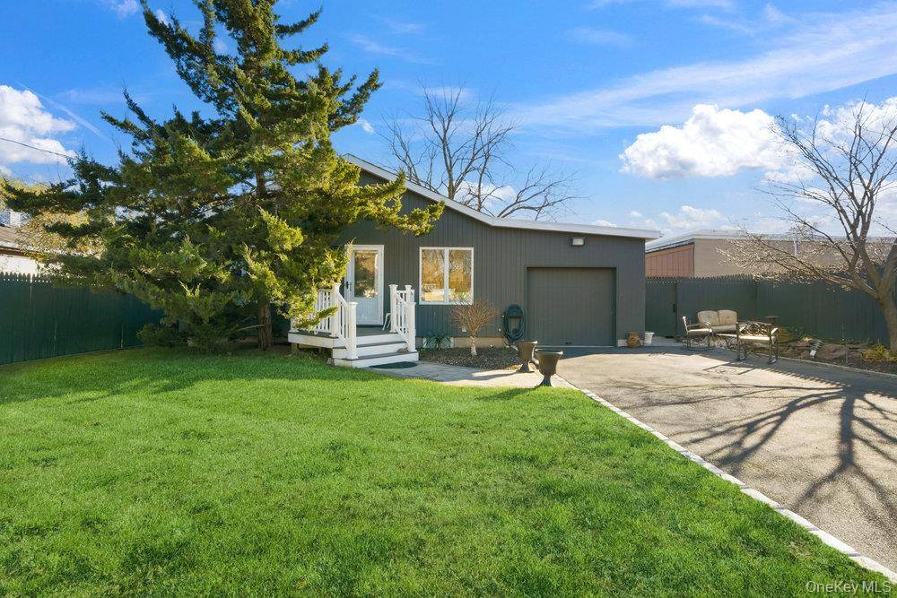 Beautiful 3 bedroom, 2 full bathroom exp ranch, featuring a brand new roof and a brand new cesspool.