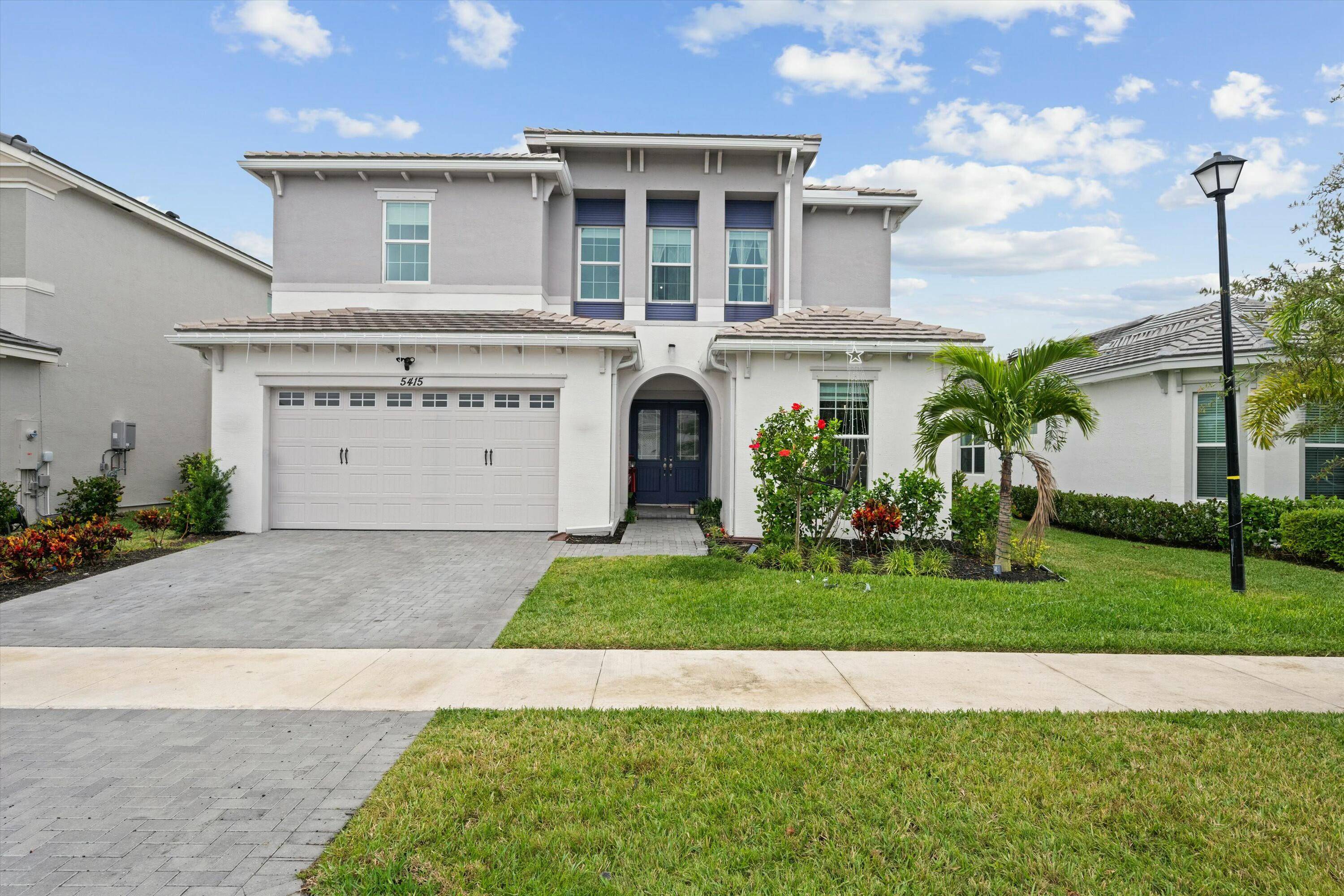 BEST DEAL IN THE MARKET. Welcome to your dream home in the exclusive Orchards community in Westlake, FL !