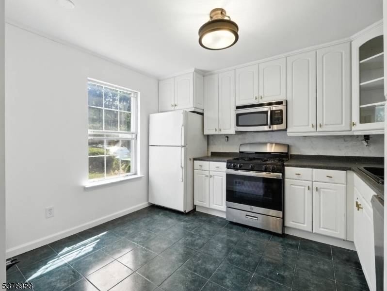 Welcome to 206 Ash Ct, an inviting 3 bedroom, 2.