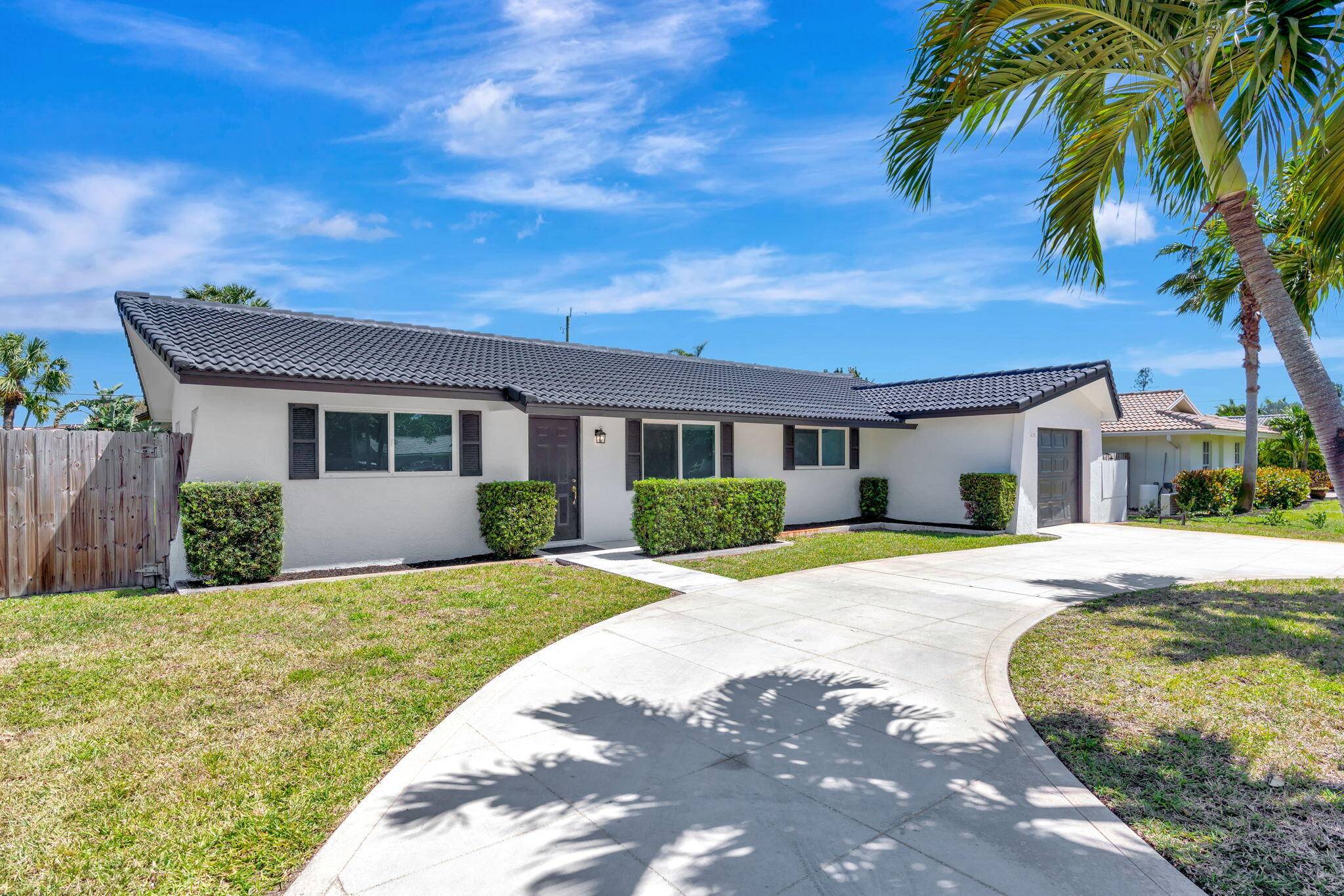SORT AFTER JUNO ISLES newly renovated single family 4 bedrooms, 2 bath home on large lot.