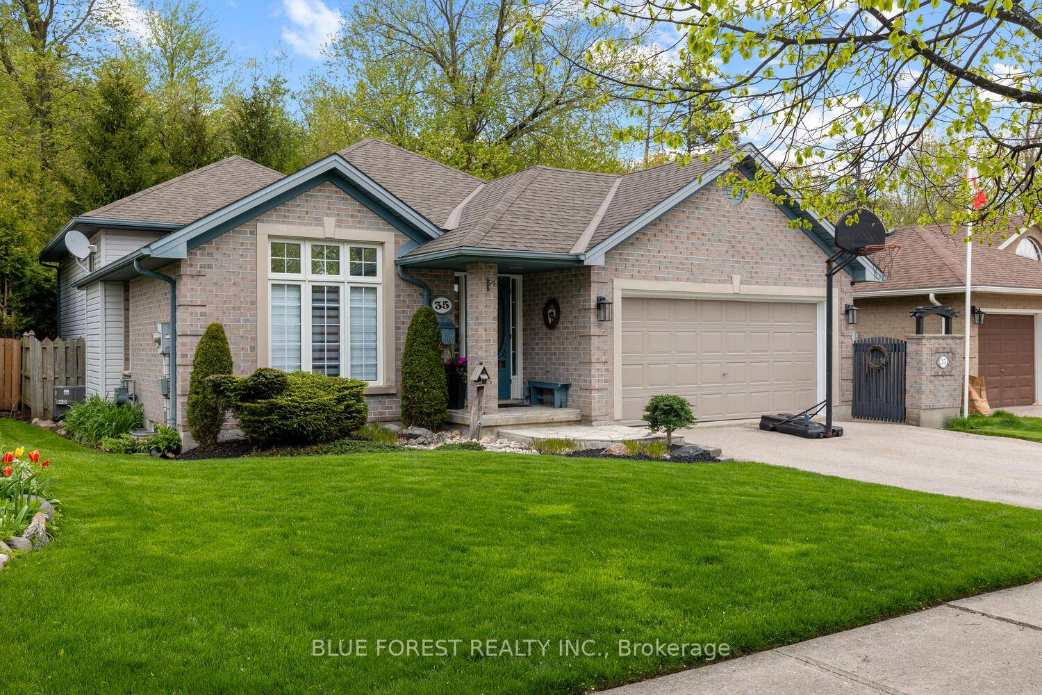 Welcome home to this beautifully maintained four level back split located on a quiet street in Trafalgar Woods.