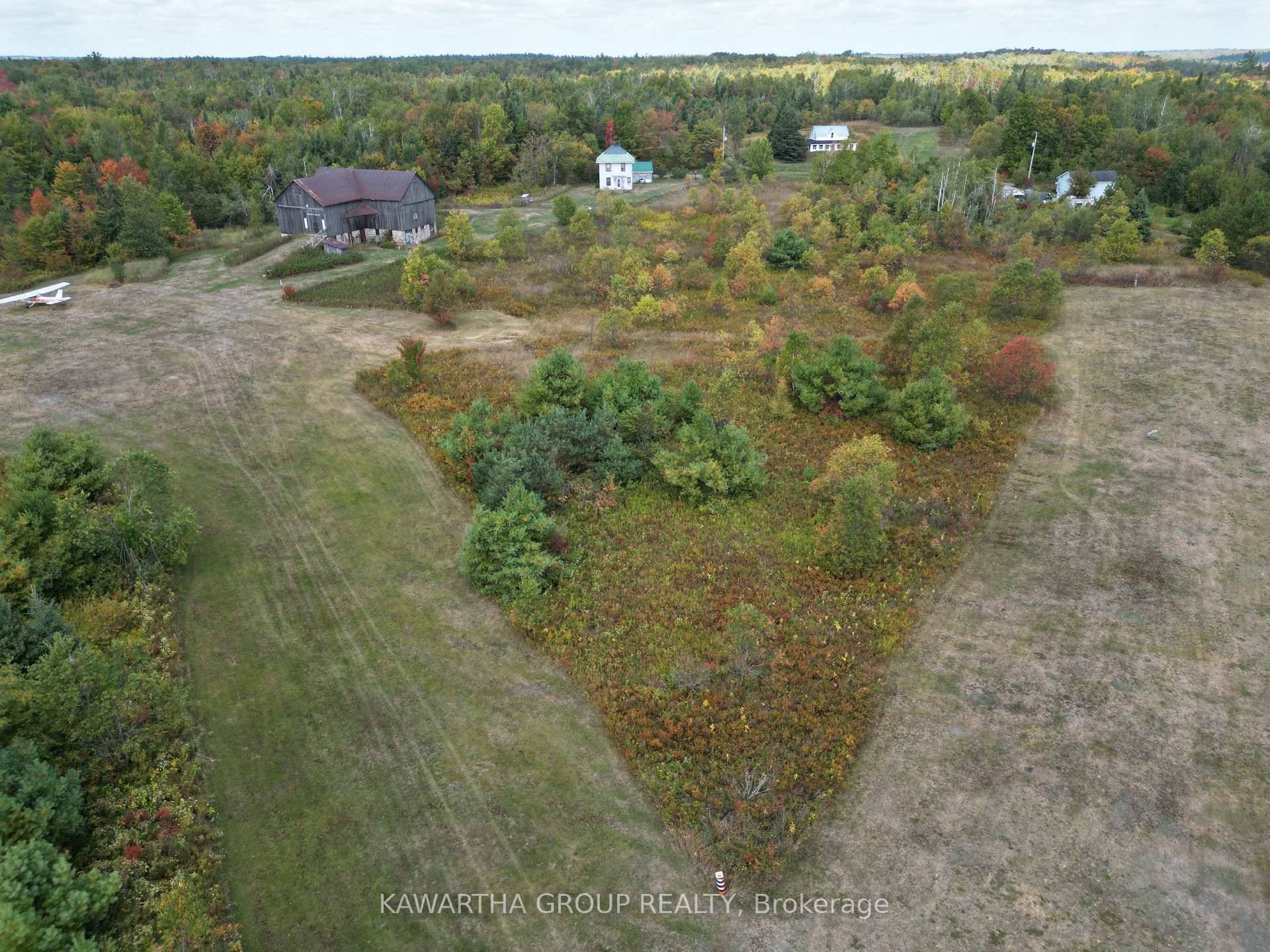 190 acre farm with 2 road frontages, that can be your main residence, weekend getaway with 2, 000' grass runway private airport, farm, hunting camp, or all the above.