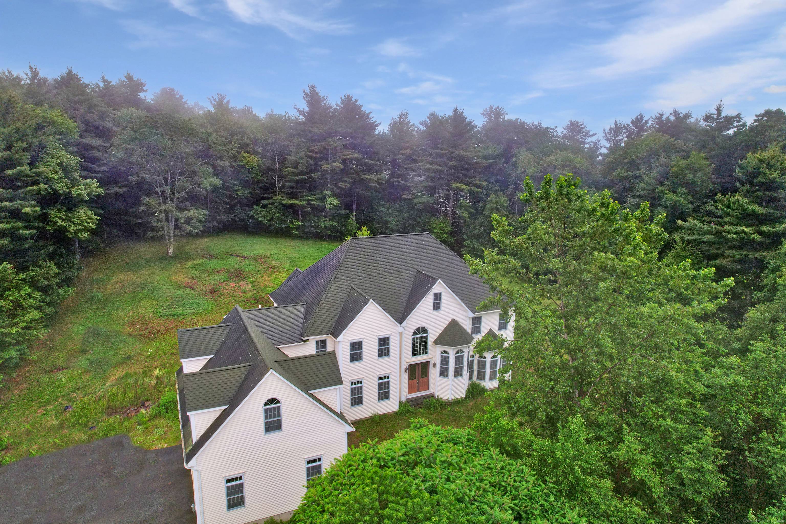 Perched up higher than the rest with sweeping views up a private driveway in beautiful Winchester Center you'll find this custom built 4, 953 sq ft Colonial nestled in on ...