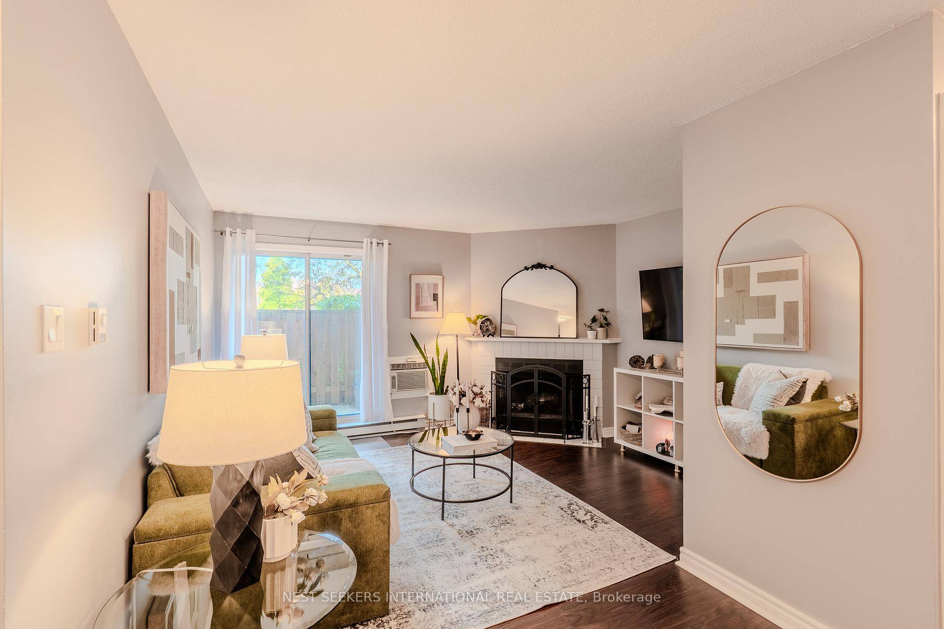 Beautiful spacious Two Bedroom Dark plus 2 Bath, Chiseled Laminate Floor In Lr Dr Combination That Has A Corner Wood Burning F P It Is Serviced By Condo Corp Yearly ...