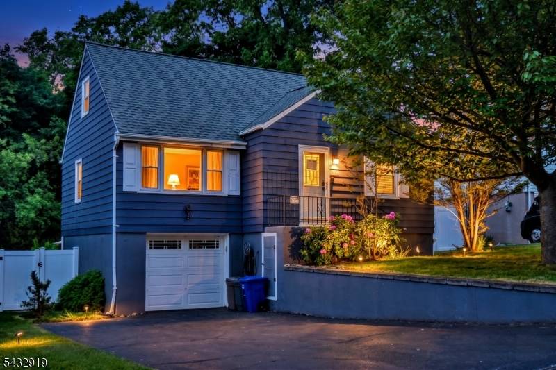 Welcome home ! Move right into this Well maintained and appointed Cape Cod situated on a large level lot on one of the nicest streets in Woodland Park.