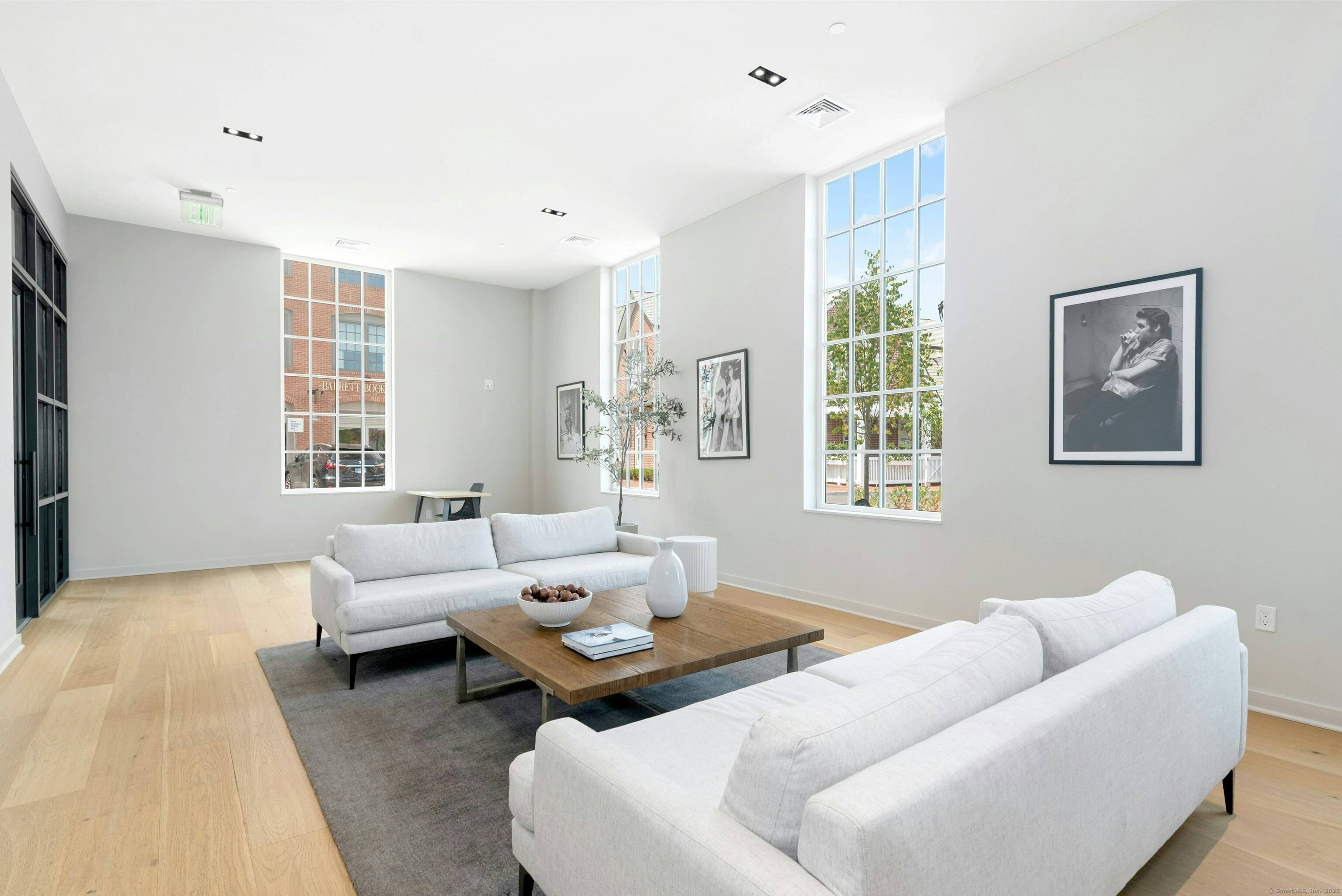 Step into this luxury unit that offers refined elegance, modern design, and privacy all in the heart of downtown Darien's premier neighborhood, The Corbin District.