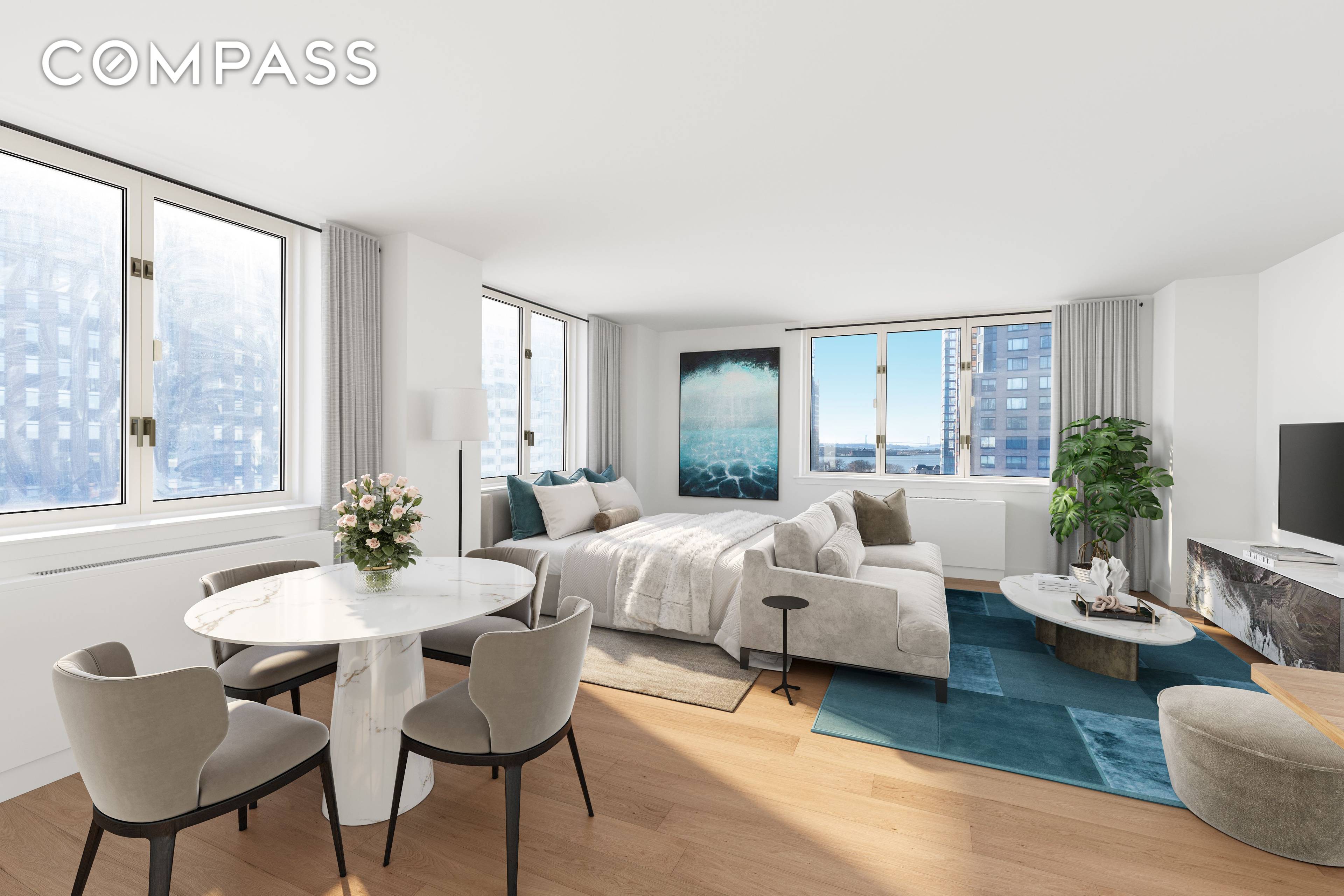 This is a large studio with breathtaking views in the most accessible building in Battery Park.