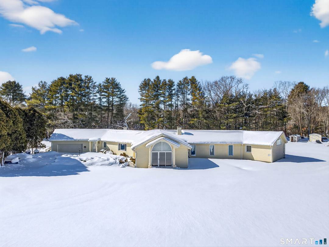 Set on 2. 99 pristine, level acres in Stonington, Connecticut, this expansive 4 bedroom, 4.