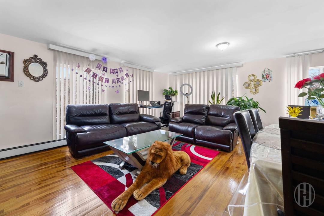 This beautifully updated 6 bedroom, 5 full bathroom apartment in Jamaica offers a perfect blend of space, comfort, and modern living.