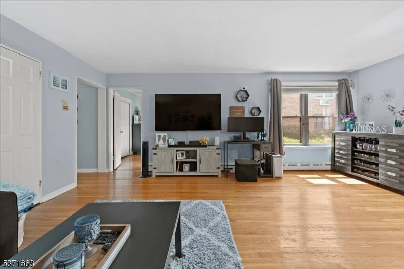 This bright and spacious 2 bedroom, 1 bath first floor condo feels like home the moment you walk in.