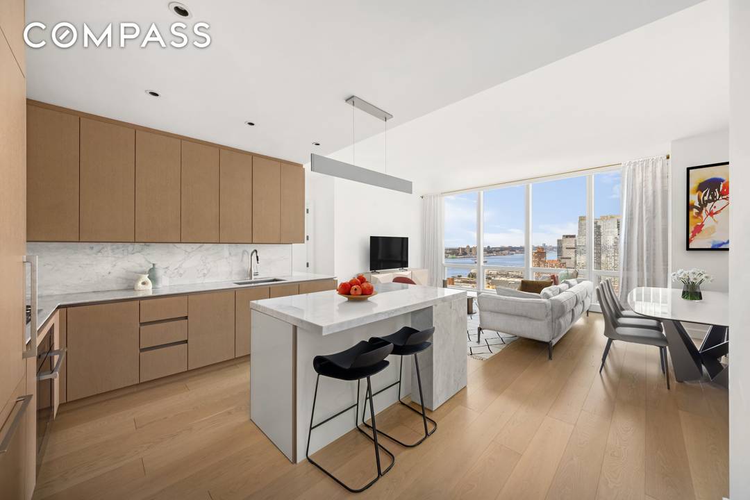 Corner Unit with Sweeping Sunset Hudson River views.