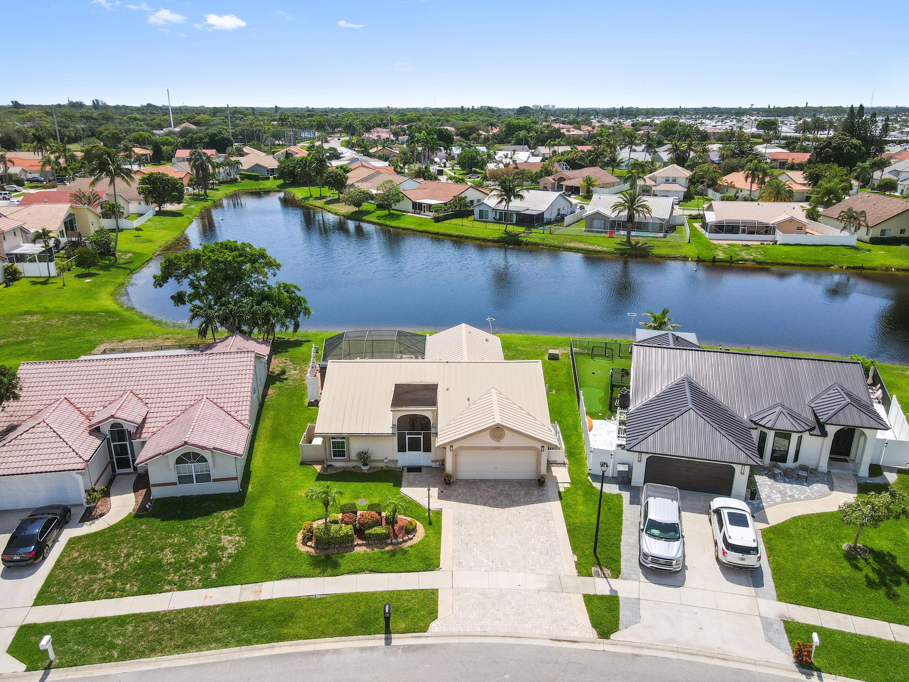 Welcome to this charming single story residence located in the desirable Fountains of Rainbow Lakes community.