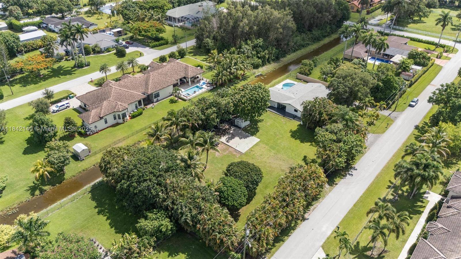 Live the elevated lifestyle in this fully remodeled Plantation Acres showstopper !