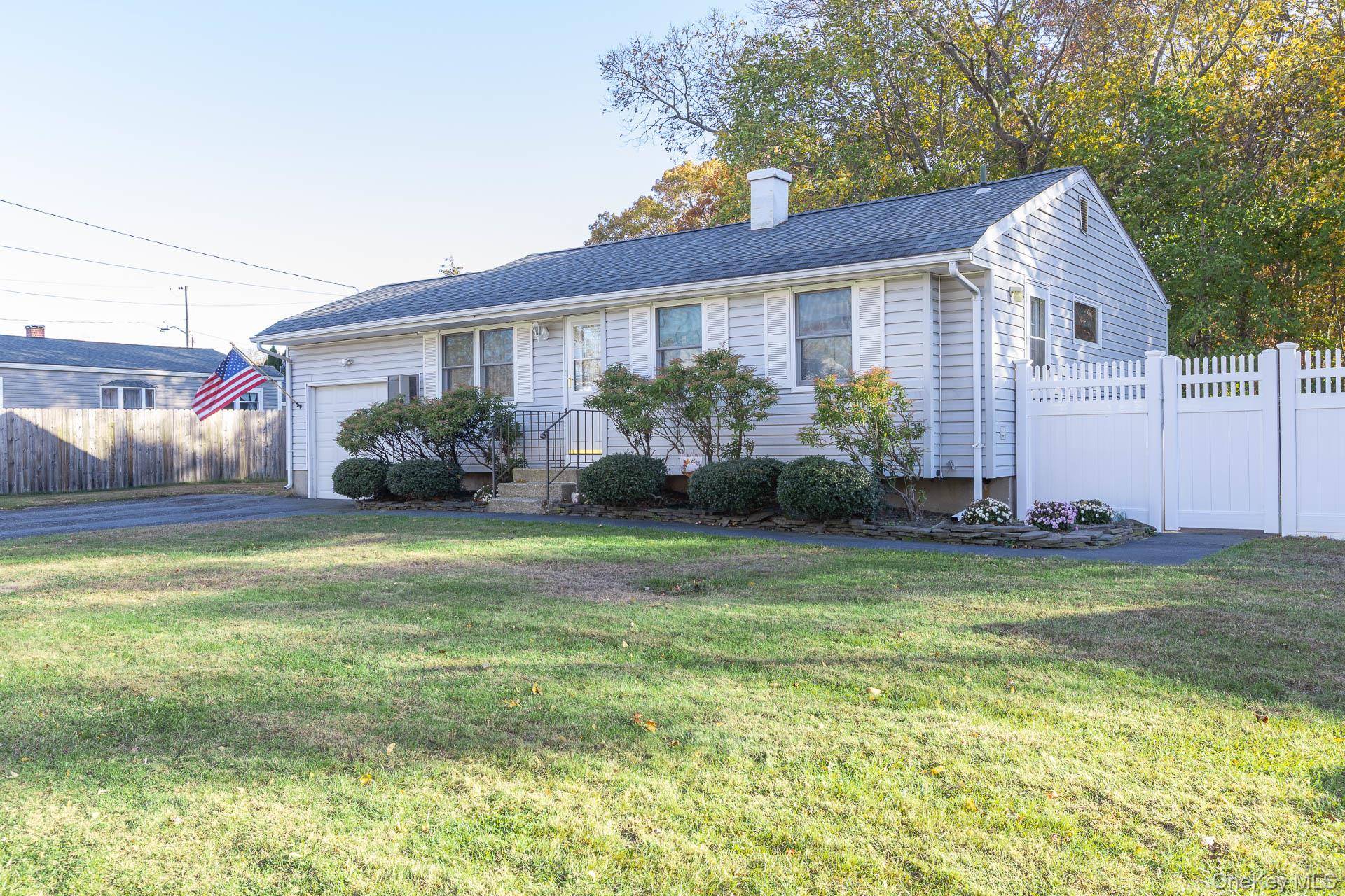 Welcome to 6 Talbot Ln, a well maintained Ranch located on a curb and sidewalk lined street in Selden.