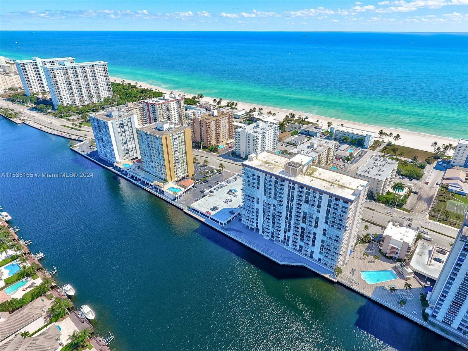 WALK IN AND FALL IN LOVE WITH THIS AMAZING MASTERFULLY UPDATED, SPACIOUS BRIGHT CORNER CONDO, THAT FACES THE OCEAN AND FROM THE WRAP AROUND BALCONY INTRACOASTAL POOL VIEW.