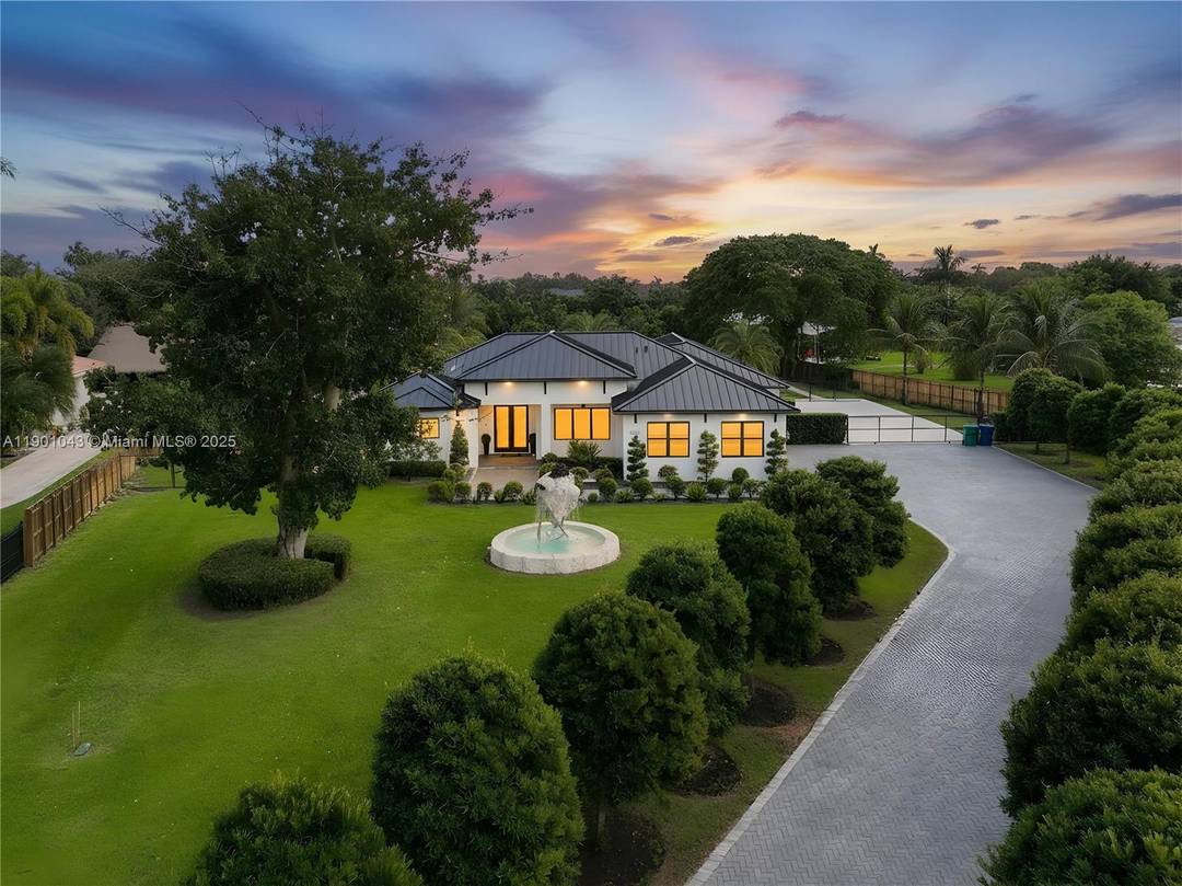 Discover this stunning 5 bedroom, 4 bath luxury residence built on a 1.