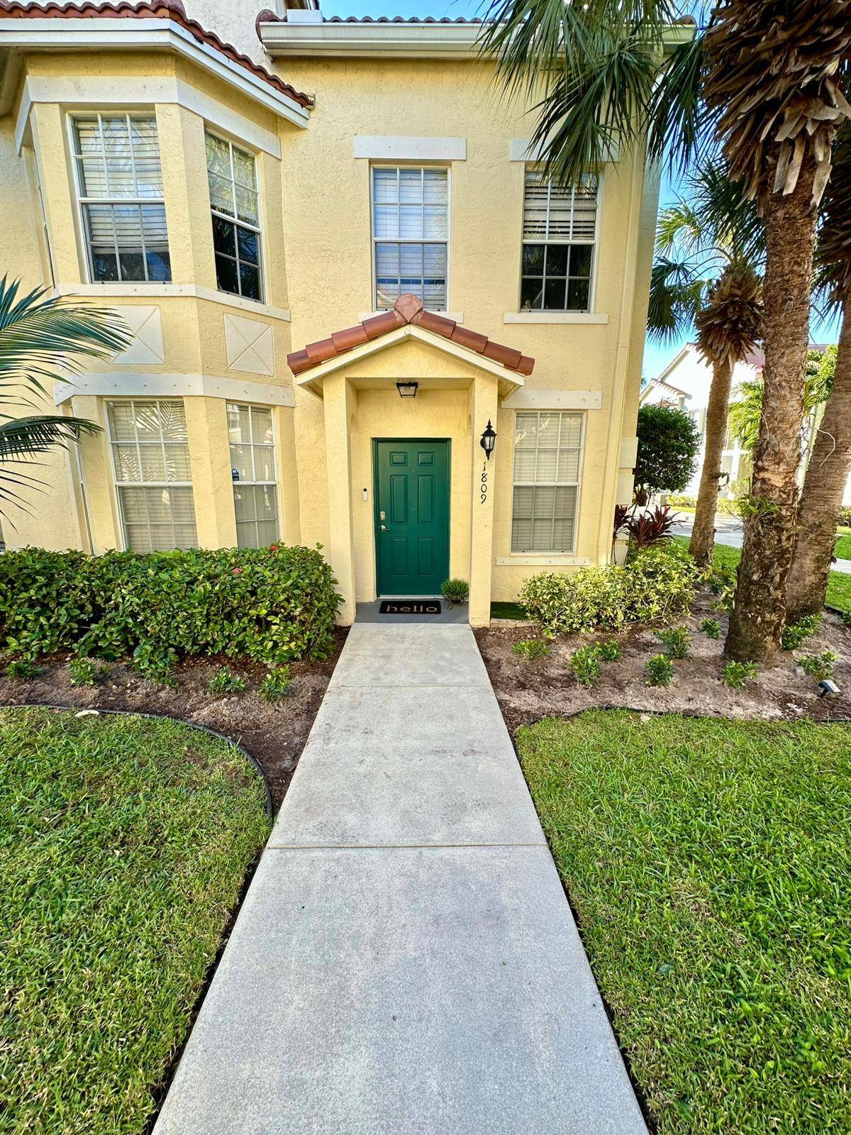 Step into this charming bright and airy corner unit with 3 bedroom, 2 bathroom home in The Residences of Belmont in Boynton !