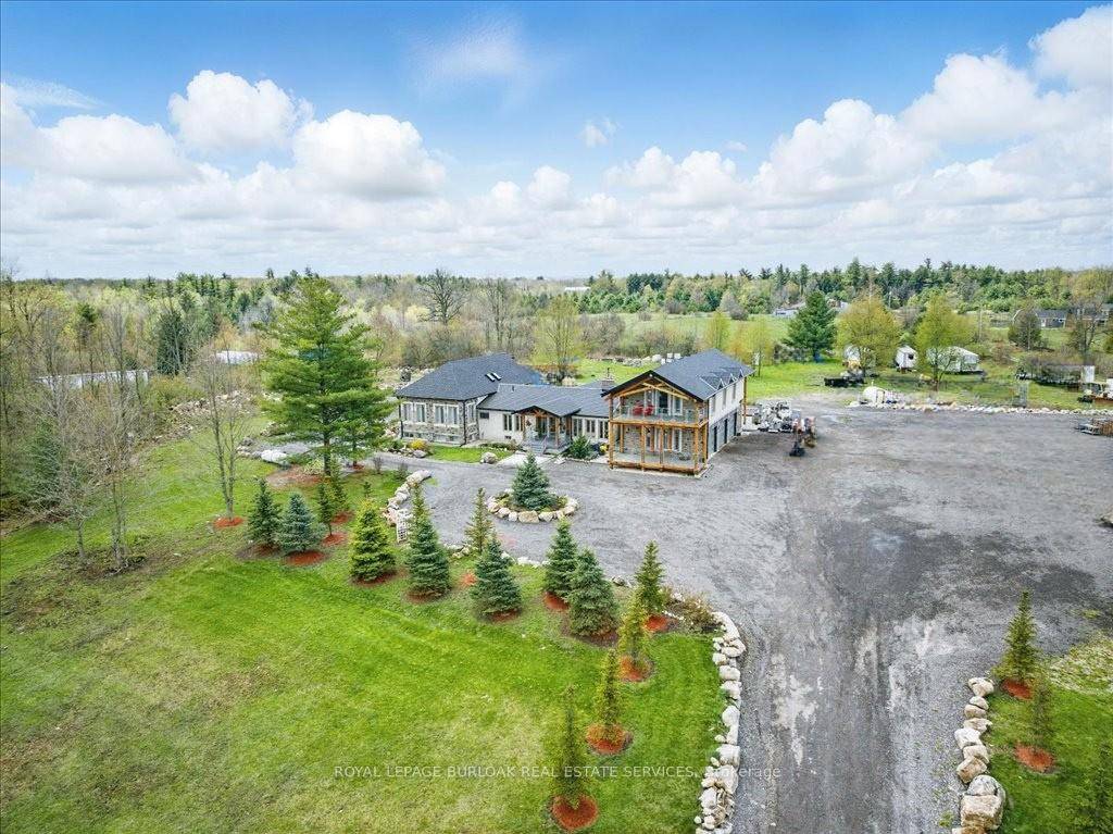Nestled on a vast 10 acre lot and bordered by serene conservation lands, this exceptional estate presents an unparalleled opportunity for multi generational living or significant rental income potential.