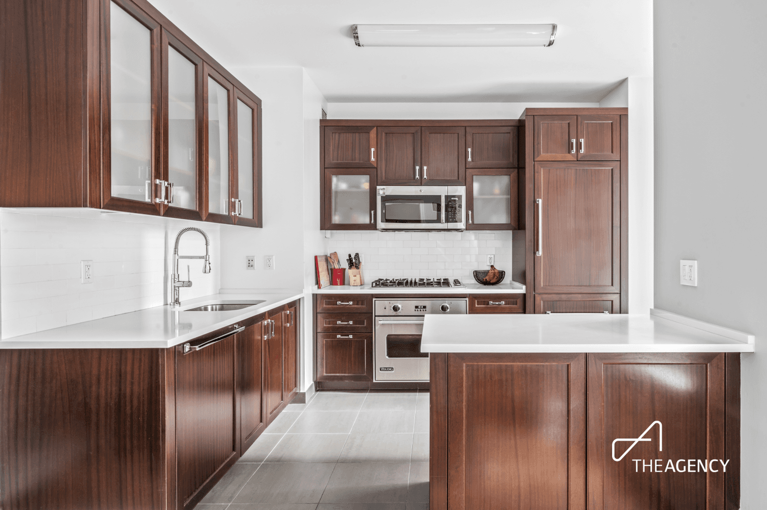 Welcome to this luxurious, sun drenched two bedroom, two bath residence at The Harrison.