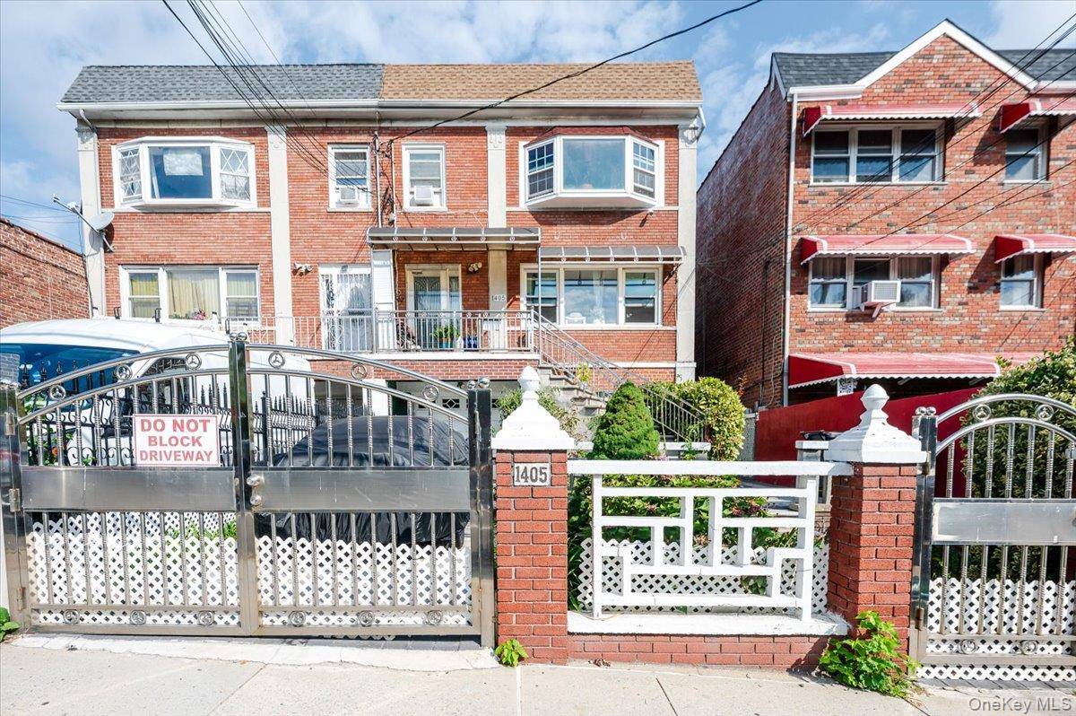 Just Listed ! This stunning brick three family home is a rare find, offering modern comfort and convenience in every unit.