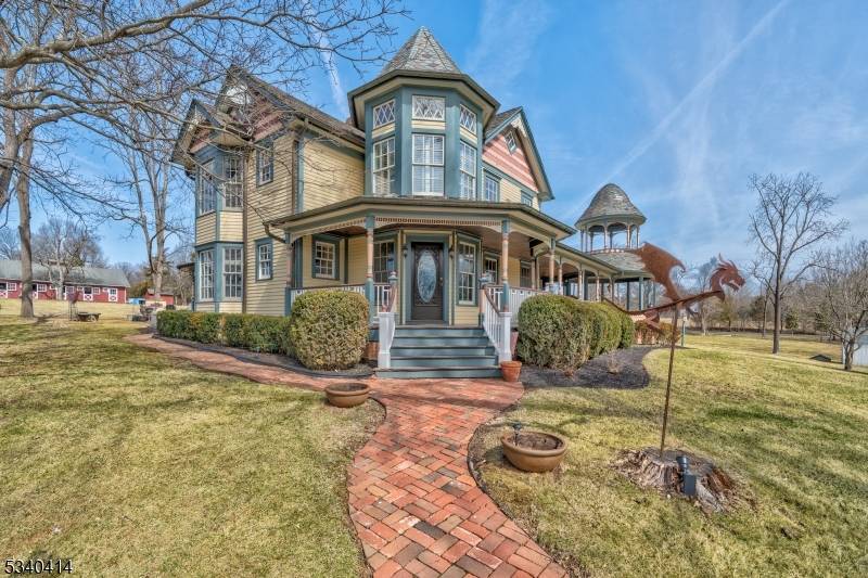 Elegant Victorian overlooking picturesque rolling fields and pastures situated on a private 40 acre horse farm in the heart of Bedminster.