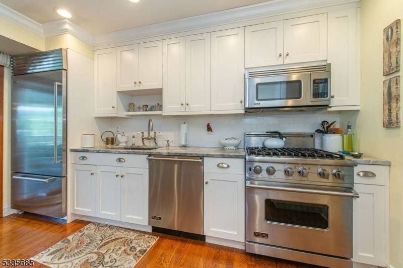 Tucked away at the end of a cul de sac, this exceptional residence showcases a rare luxury In law suite, complete with two spacious bedrooms, a gourmet eat in kitchen, ...