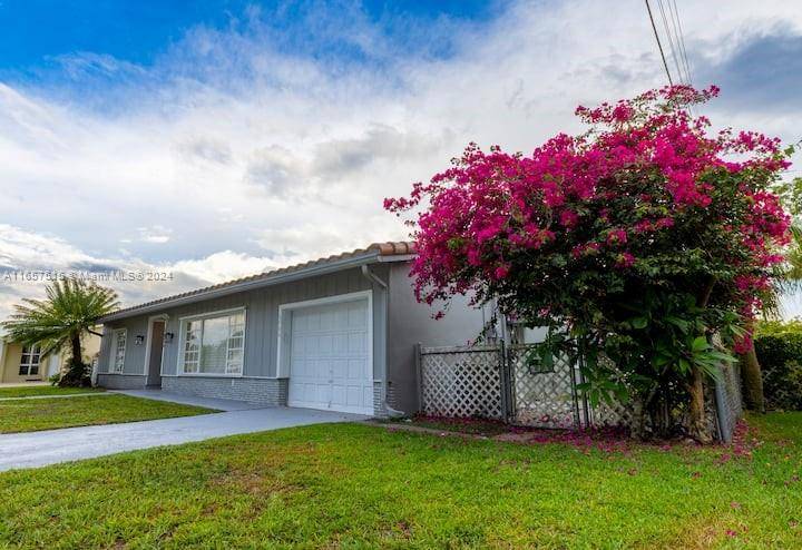 Two master bedrooms, 4 Bedrooms total and 3 Full Bathrooms with garage, Pool and RV Parking.