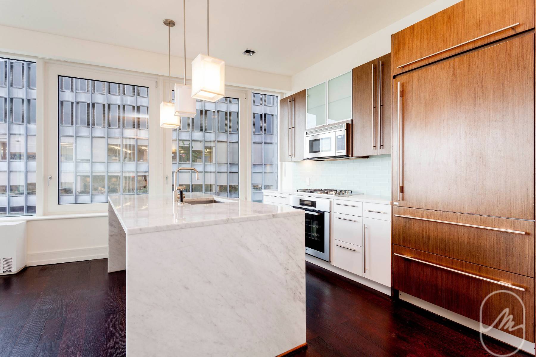 Corner two bedroom with sweeping water vistas, two baths, powder room, and great closet space now available.