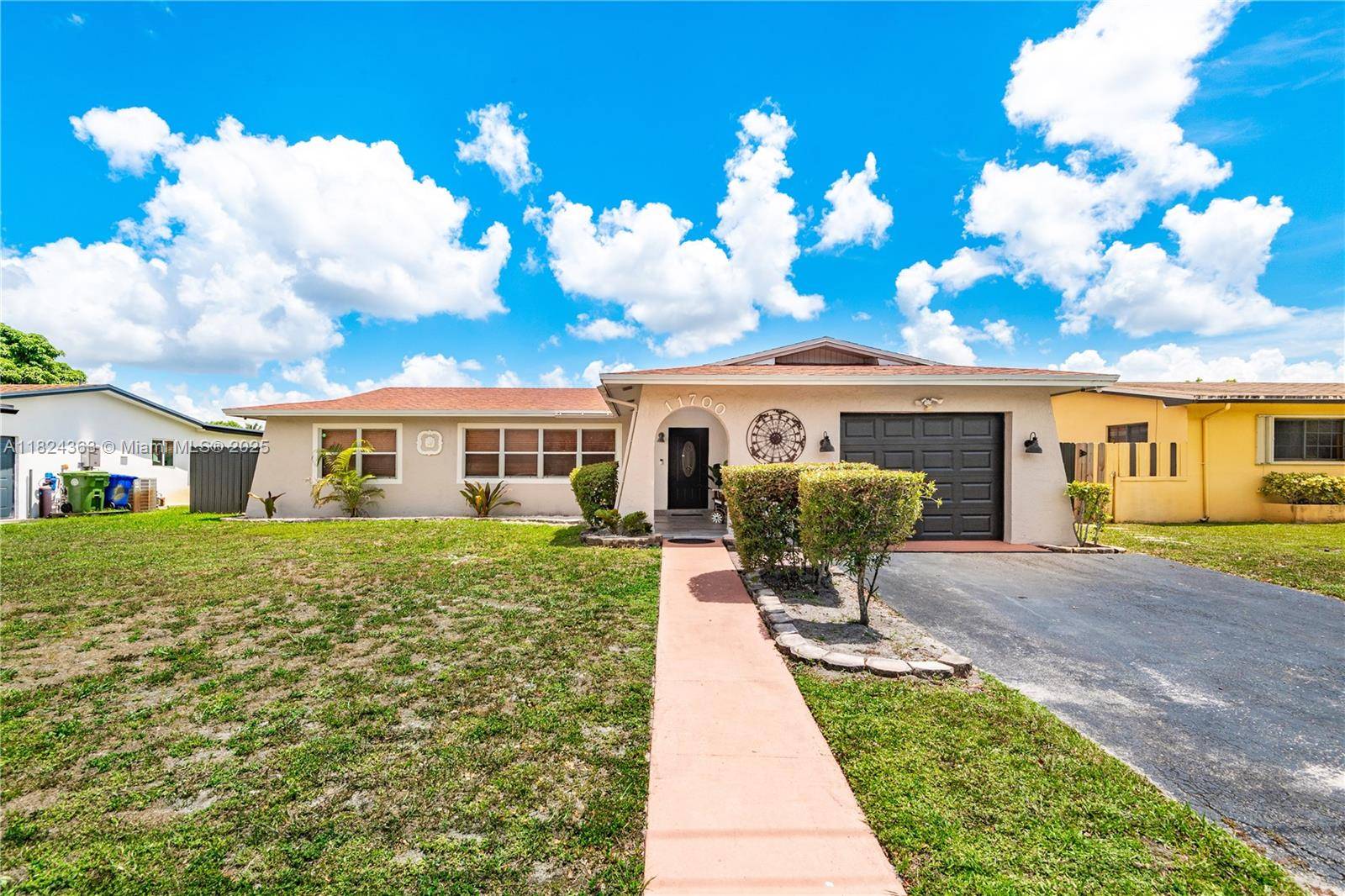 Beautiful Pool Home with 3 bed, 2 bath and a converted garage making this a 4th bedroom home.