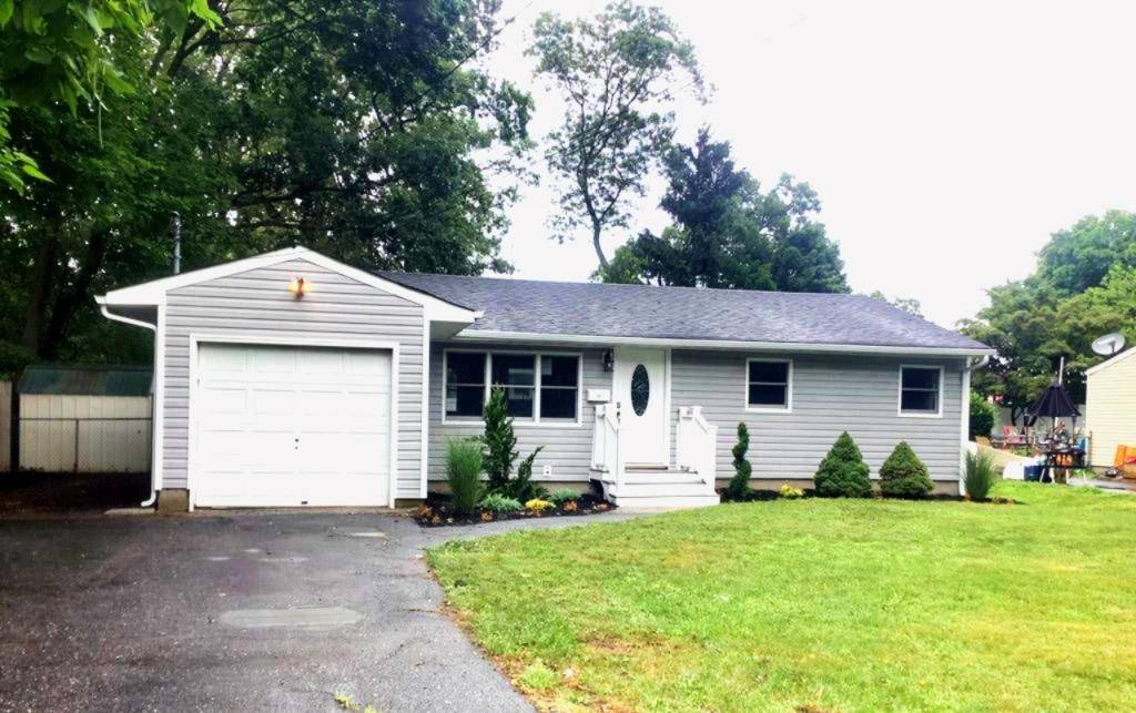 Welcome to this recent beautifully remodeled and updated 3 bedroom, 1 bath ranch, ideally located at 4991 Express Dr N in the heart of Lake Ronkonkoma.