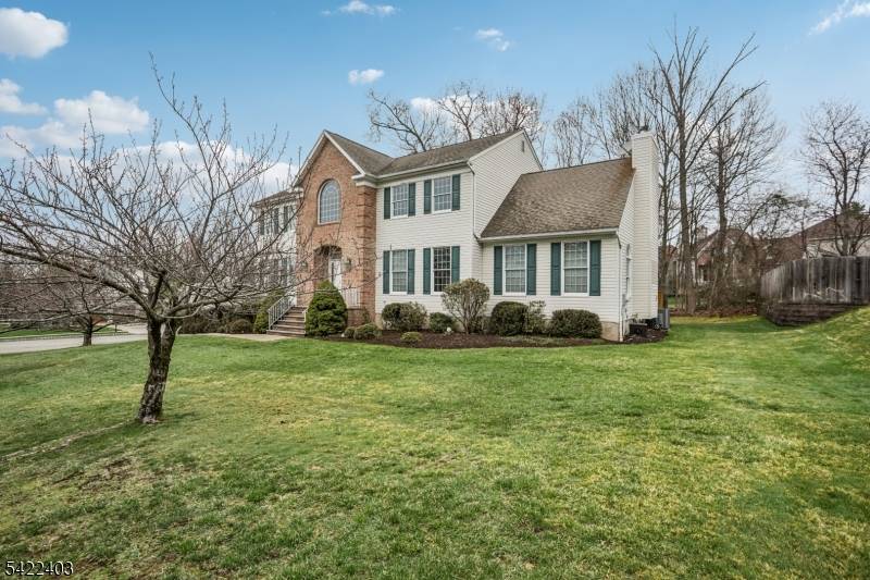 Stunning center hall Colonial offering exceptional space, style, and functionality, featuring a grand 2 story Entry Foyer, Living room, Formal Dining room and Modern Eat in kitchen with center island, ...