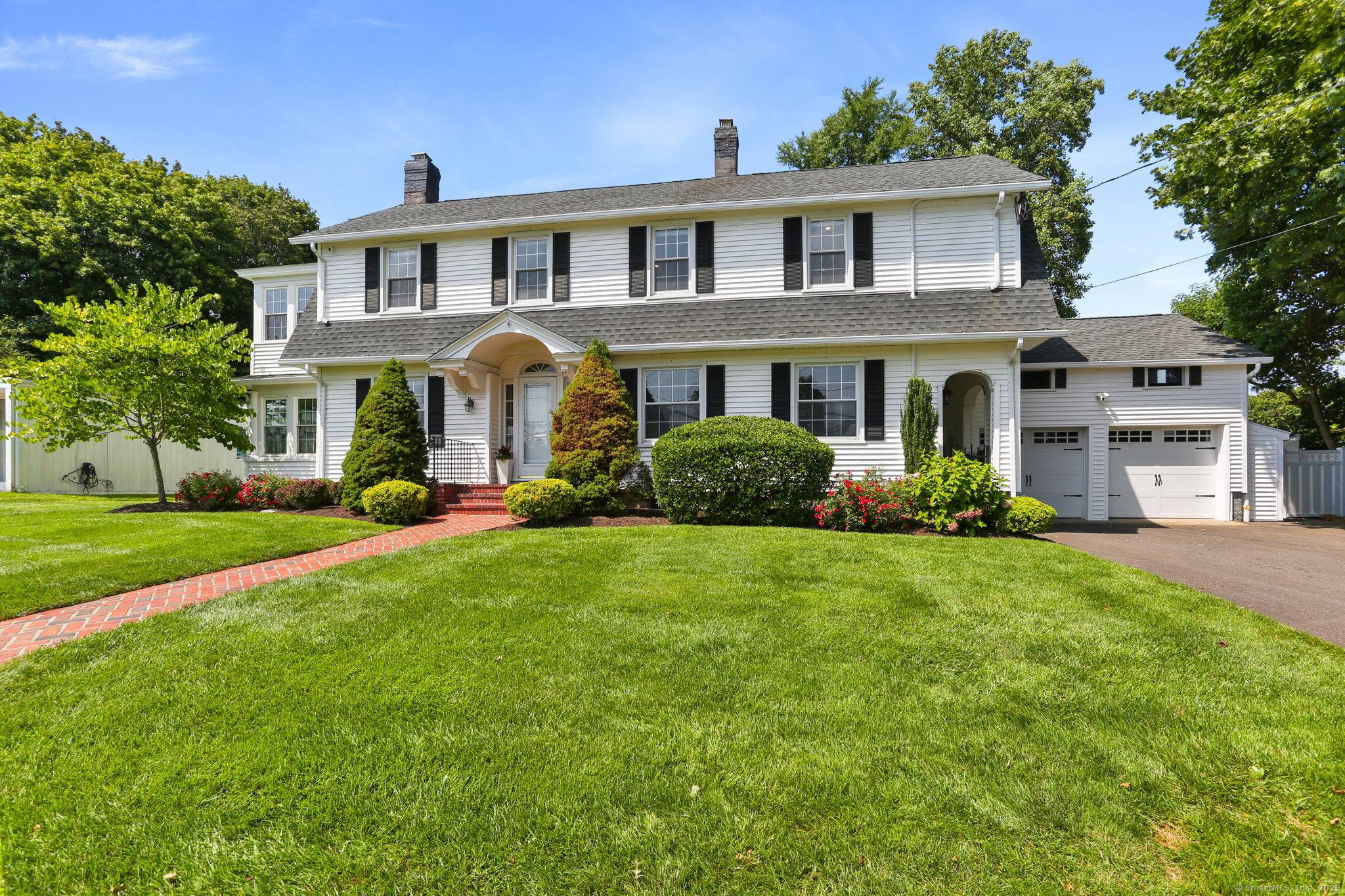 This classic updated 1920s Colonial has four bedroom, two and a half bath.
