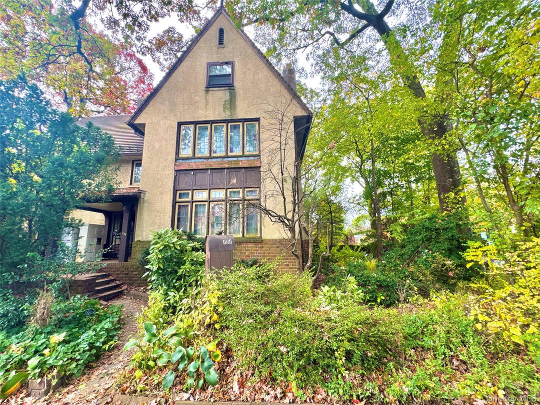 FOREST HILLS GARDENS Introducing this very rare opportunity to make this very special home in The Gardens into your own.