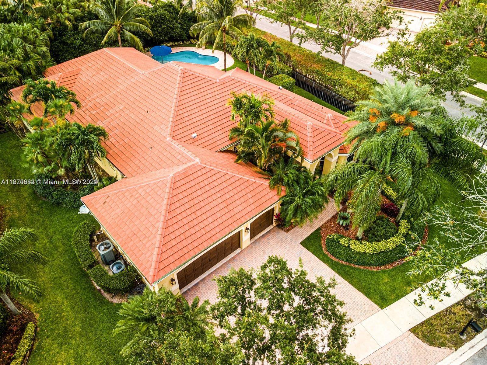 Beautiful one story corner lot home located in the most sought after Guard Gated community of The Landings in Weston.