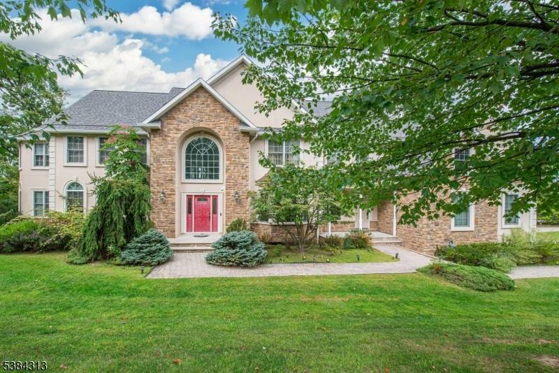 Welcome to this expansive Colonial in a prestigious neighborhood !