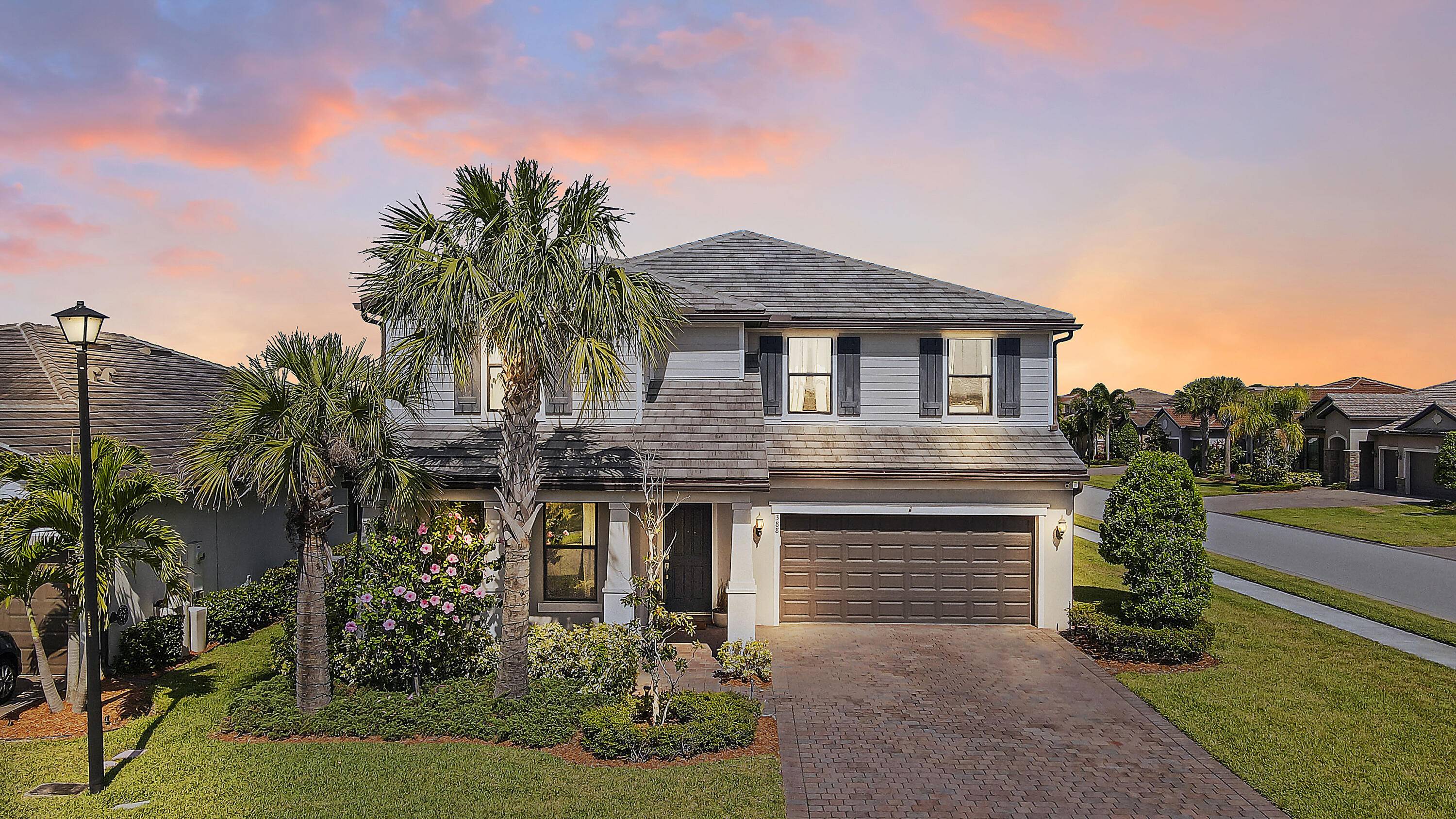 Welcome to 388 SE Courances Drive, a breathtaking 2019 built home that seamlessly blends luxury, comfort, and modern style.