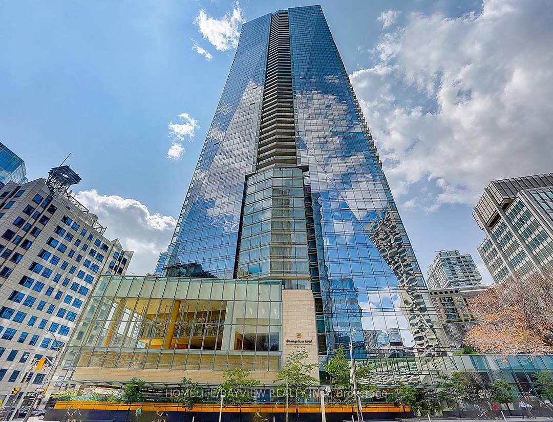 Luxury 2 Bed Den at Shangri La TorontoStunning 54th floor corner suite with panoramic city views, 10 ceilings, automated sunshades, and premium finishes.