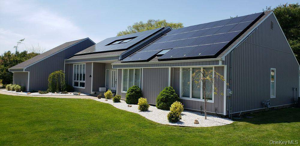 Beautifully updated center hall ranch in the Miller Farms section of Miller Place.